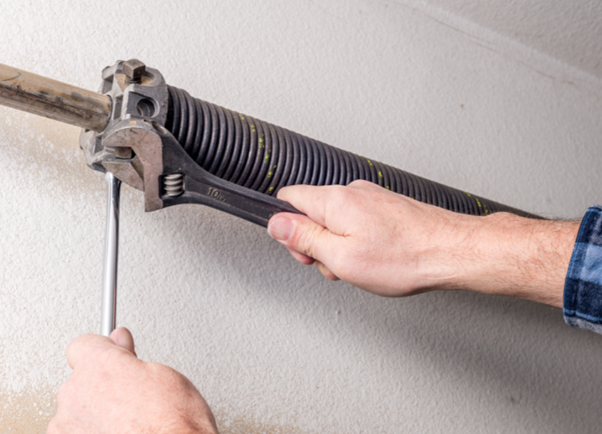 Read more about the article <strong>Broken Garage Door Spring Repair: What Safe, Durable Fixes Require</strong>